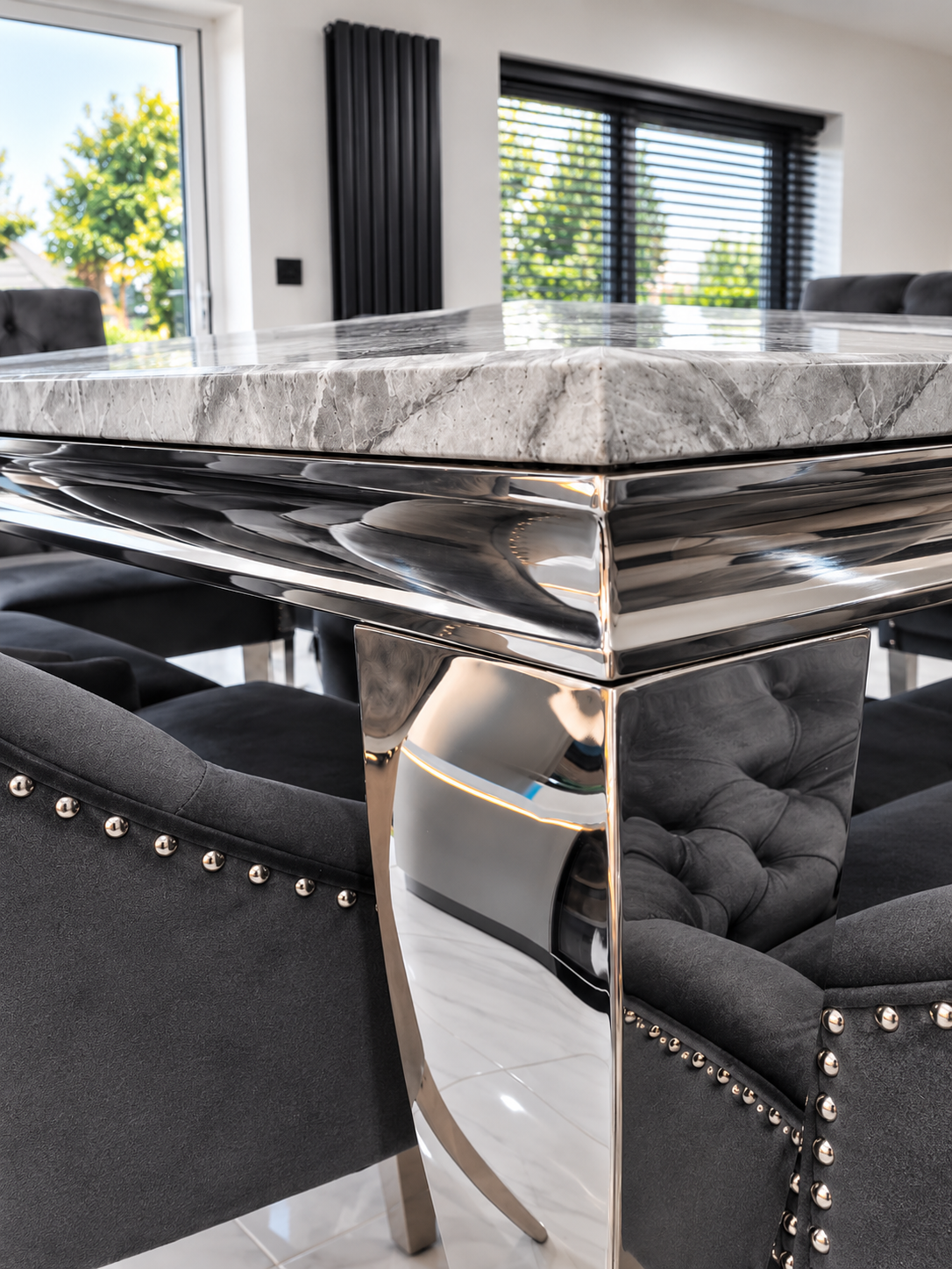 Louis Trafalgar Marble Dining Set – Polished Chrome Curved Base & Grey Marble Top Close Up | Starlight Distribution