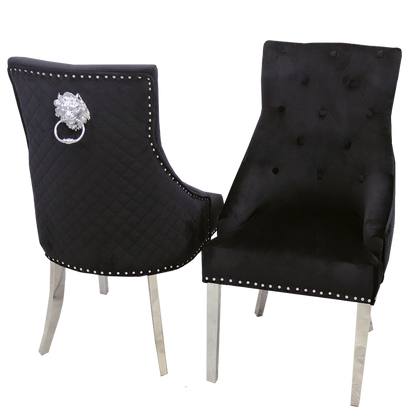 Two black upholstered chairs with decorative elements on a white background